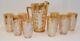 Jeanette Carnival Glass Iridescent Marigold Sunflower Pitcher & 8 Glasses Set